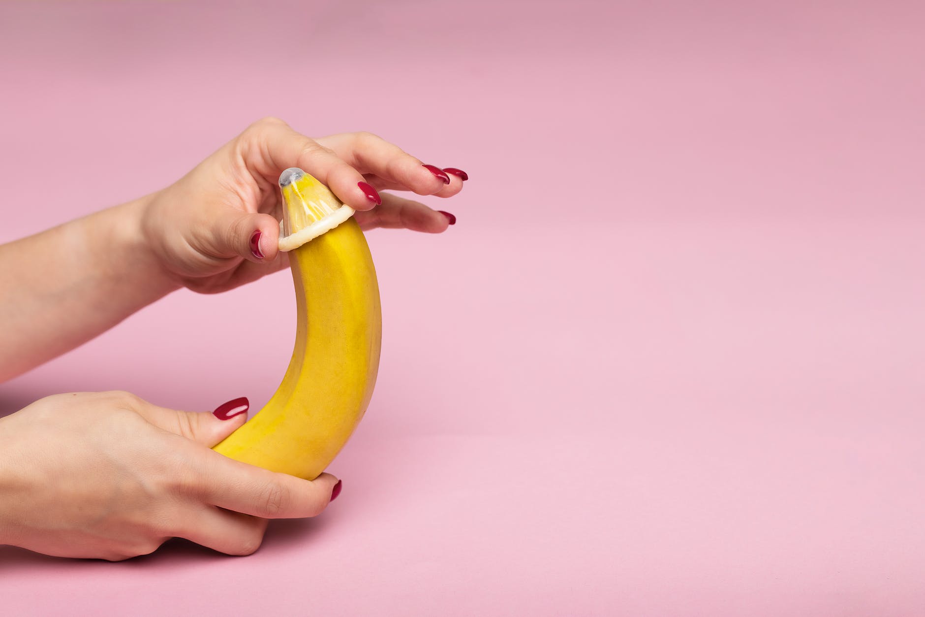 a person holding yellow banana fruit